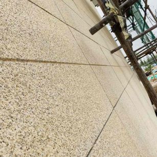 雅安 黄金麻花岗岩荔枝面外墙干挂石材效果示例