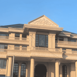 雅安黄金麻别墅外墙干挂石材效果示例