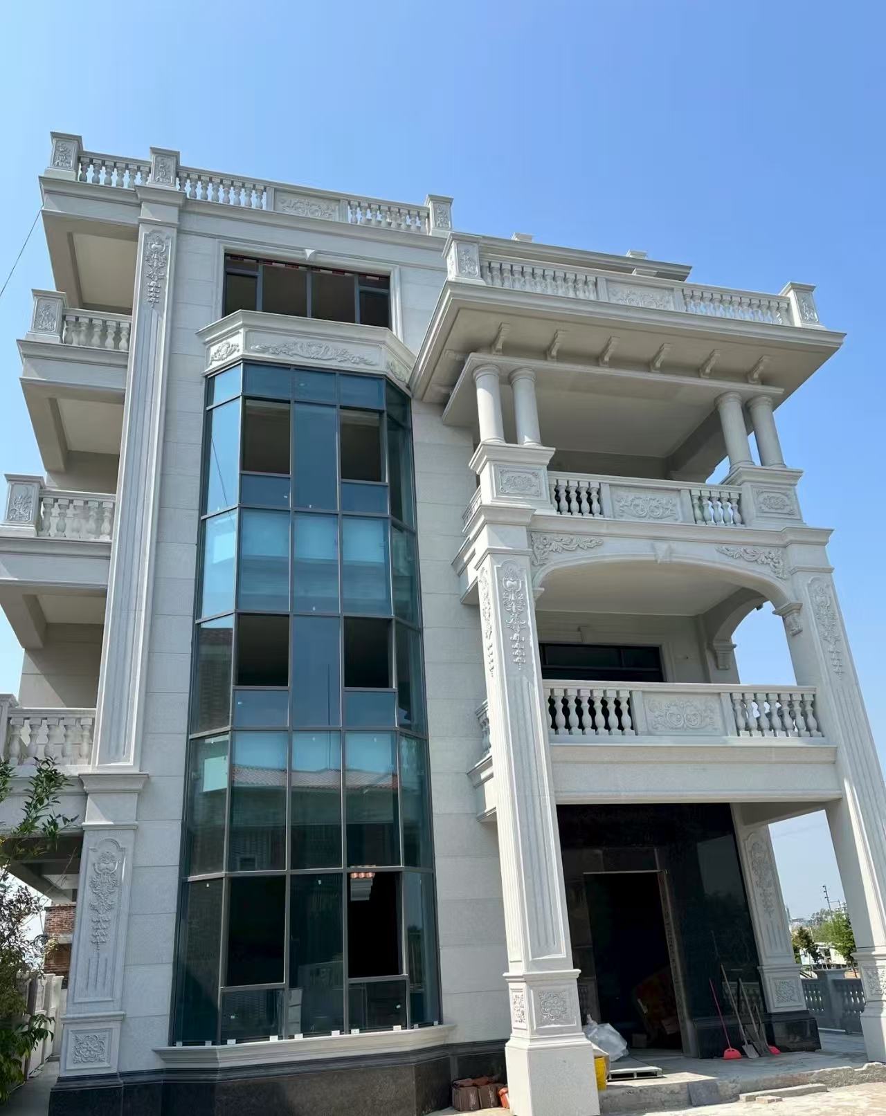 雅安 白麻花岗岩别墅外墙干挂效果展示