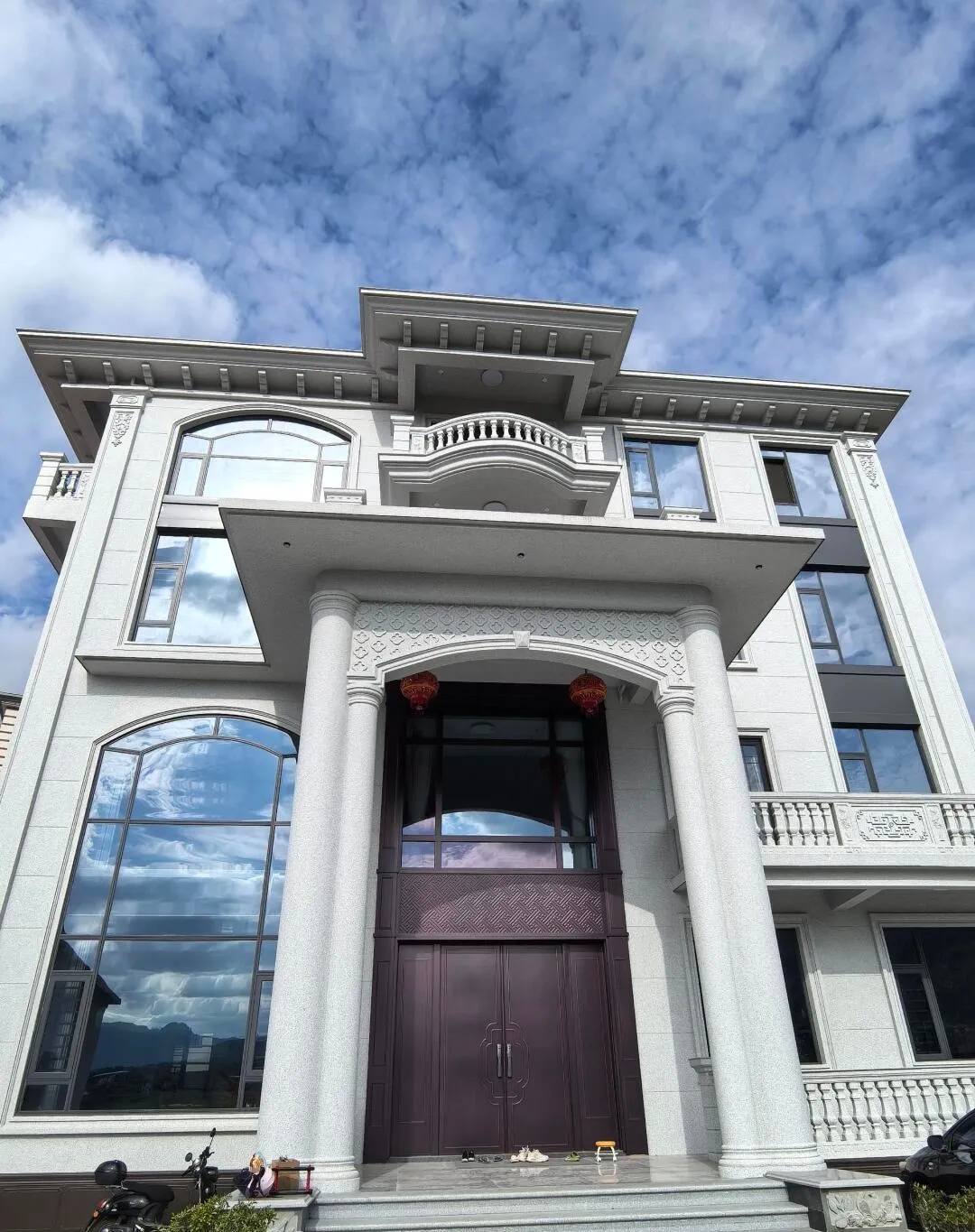 雅安白麻别墅外墙干挂石材效果示例